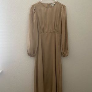 A. Calvin gold dress.